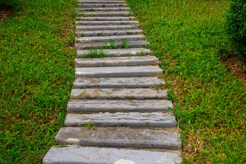 Stone walkway and landscape steps connecting outdoor areas